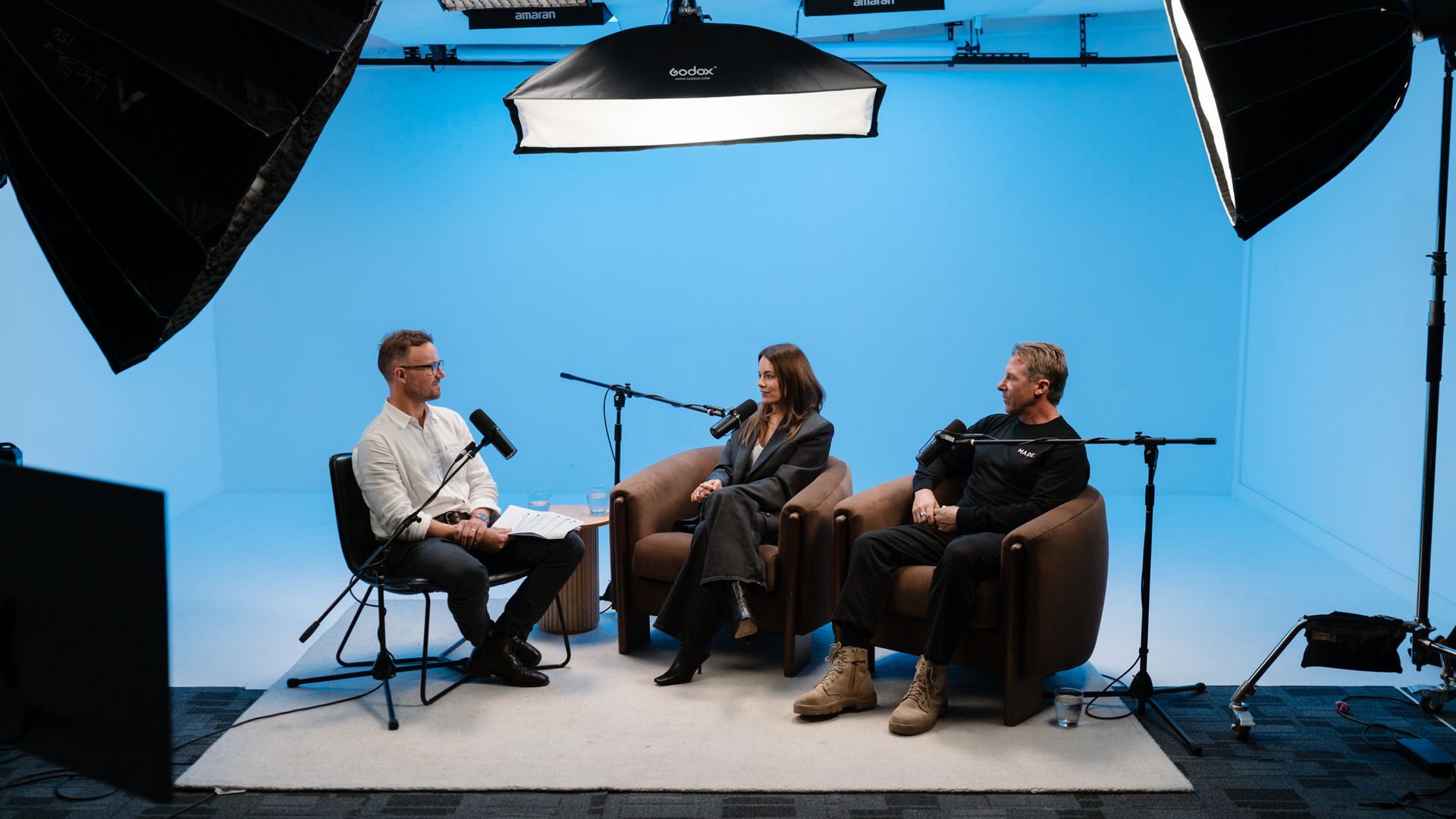 Tom Haigh recording The Australian Property Show with two guests in the studio